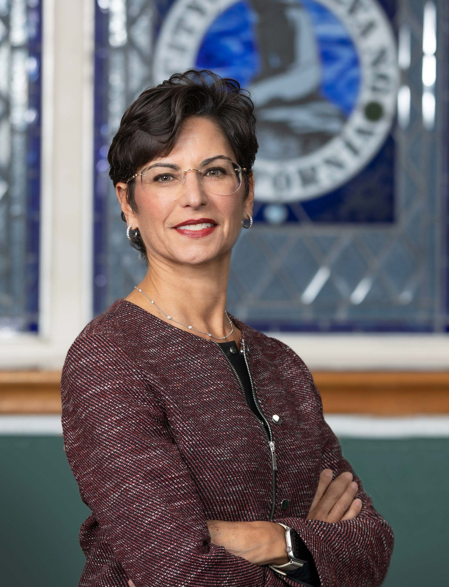 Portrait of Elizabeth Orona with the Solvang city seal